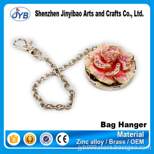 high quality strong fashion design round diamond bag hanger for women